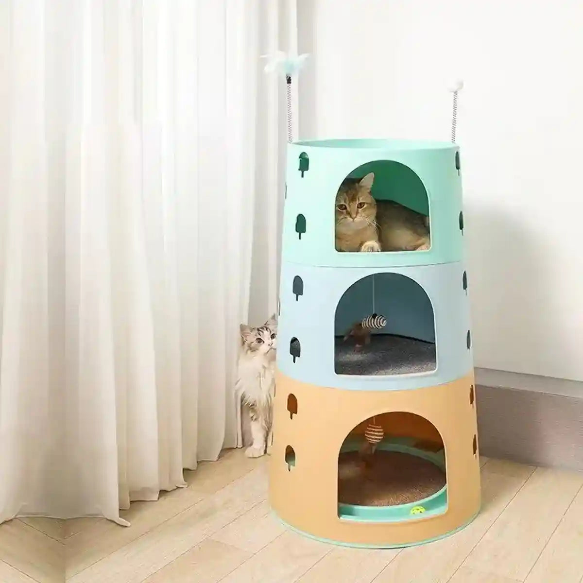 Multi-level cat tower bed with scratching board and toys
