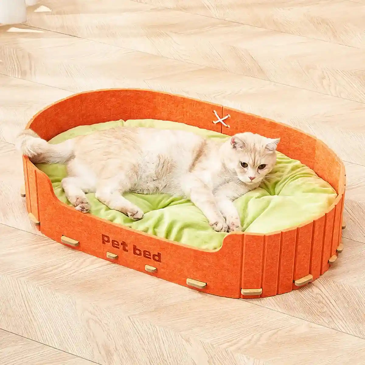 Modern felt cat bed with reversible orange and green cushion