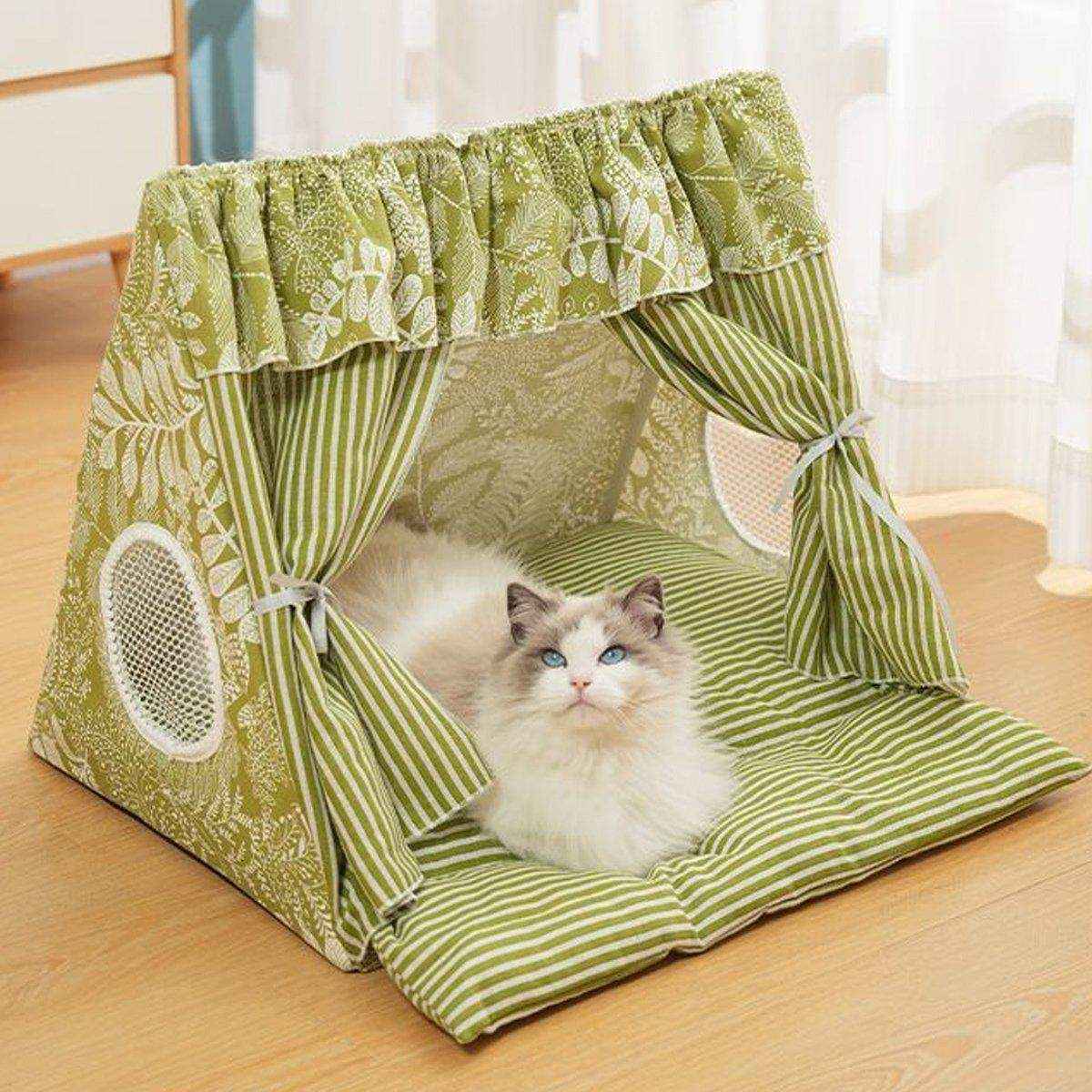 Semi-closed cozy cat tent with a soft fabric and ventilated window for small pets.