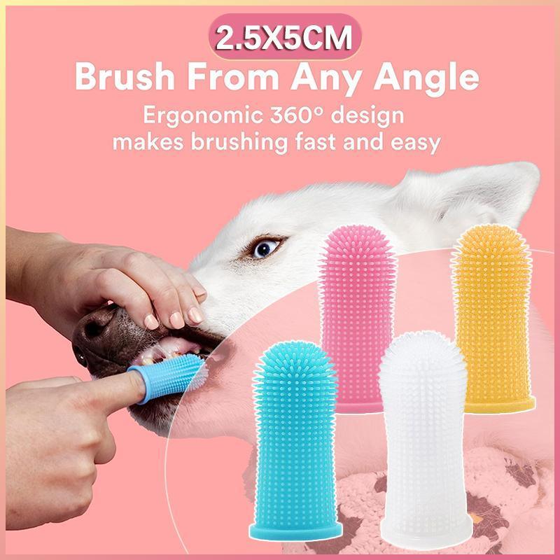 Soft silicone finger toothbrush for dogs shown on finger