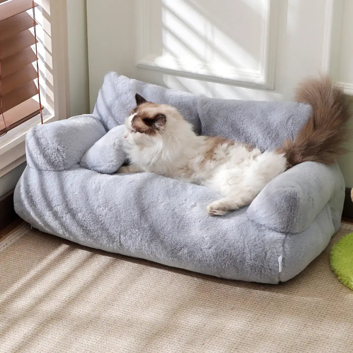 Ultra-soft cat sofa bed in light grey with armrest design for cats and small dogs